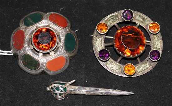 Three Scottish silver and hardstone brooches.